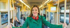 Young woman smiling posing travelling underground